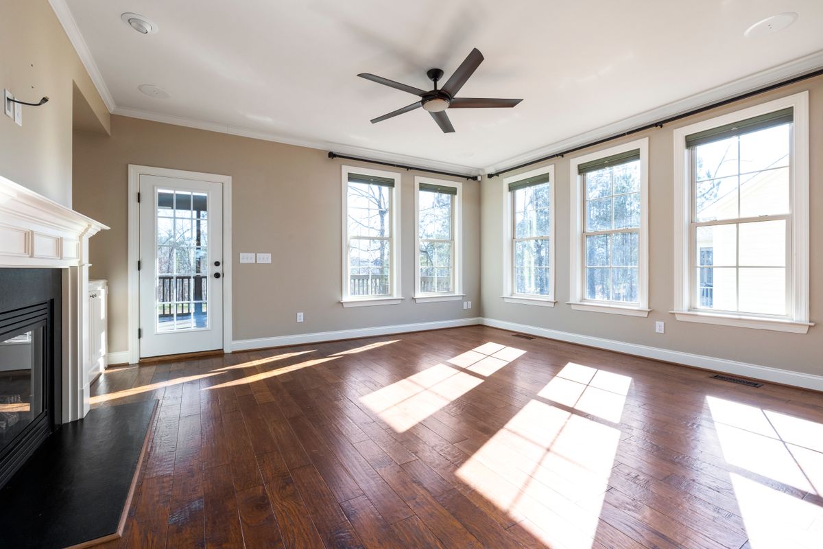 Living room with a ceiling fan installed on a mounted electrical box